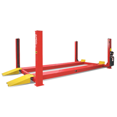 AMGO PRO-30 30,000 lb four post service lift with red columns, diamond plate runways, and yellow approach ramps