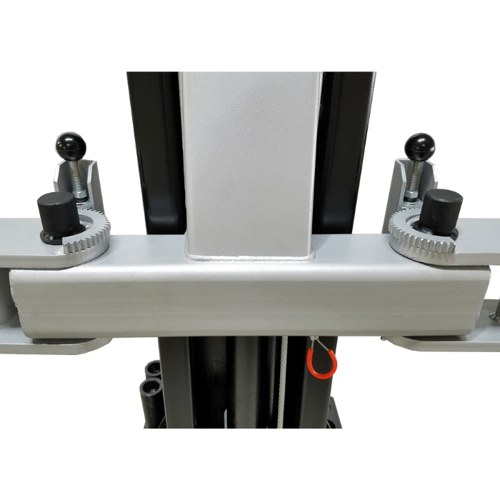 Adjustable arm restraints on Tuxedo TP9KF-TUX 2 post car lift for secure lifting
