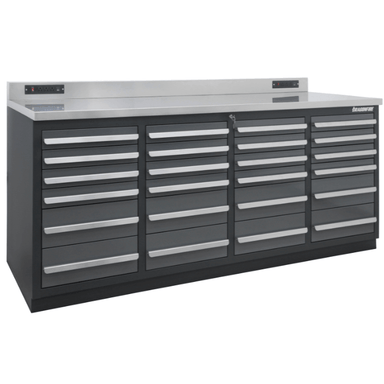 Angled front view of the gray Dragonfire Pro Series 7FT workbench with 24 drawers and stainless steel top, model DFT-WB-24