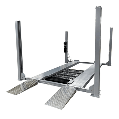 Angled side view of the Triumph NSS-11 11,000 lb Four-Post Overhead Car Lift, featuring diamond-plate runways, tall steel columns, and integrated ramps for convenient vehicle loading.