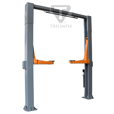 Angled side view of the Triumph NTO-15 15,000 lb Two Post Overhead Car Lift, highlighting its reinforced gray columns, orange lift arms, and open-top design for lifting heavy-duty trucks and commercial vehicles.