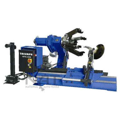 Angled view of the Triumph NTC-650 Tire Changer featuring heavy-duty clamp arms and a powerful rotating mechanism for efficient truck or bus tire servicing.