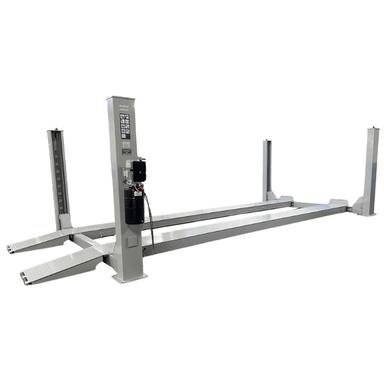 Angled view of the Triumph NTR-24 24,000 lb Heavy-Duty Four Post Vehicle Lift with diamond-plate runways, robust steel columns, and a powerful hydraulic motor.