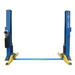 Atlas BP12000X baseplate two-post lift shown with arms lowered, emphasizing its wide stance and heavy-duty commercial frame.