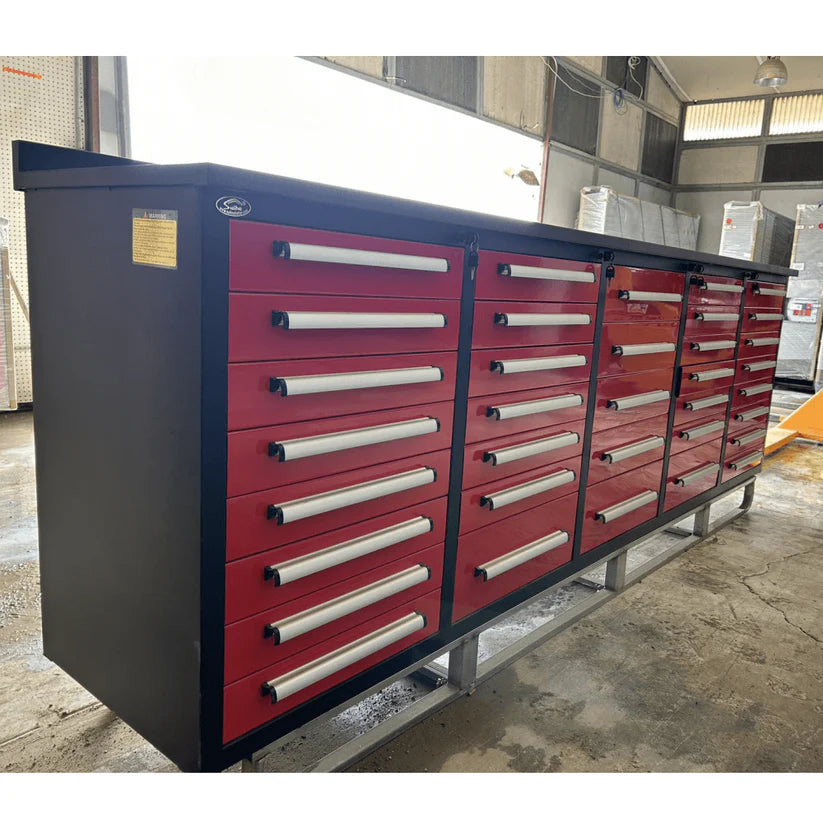 Chery Industrial red 10ft workbench with 35 drawers shown in workshop setting