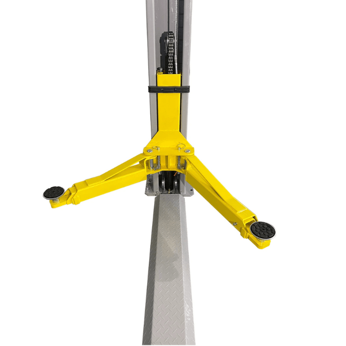 Detailed view of the Triumph NT-9 lift arm assembly with heavy-duty pads and chain drive column