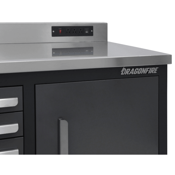 Dragonfire logo and stainless backsplash power outlet close-up on the gray Pro Series 9FT workbench (DFT-WB-18)