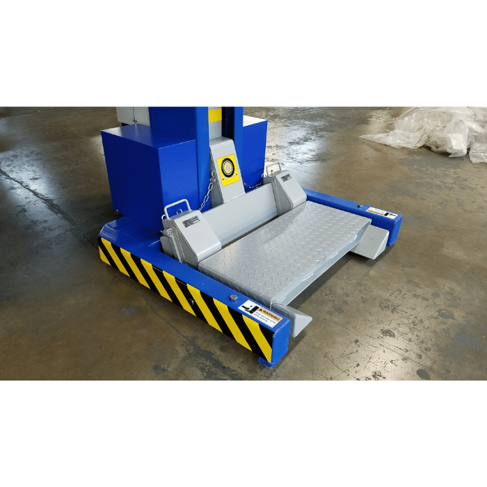 Forklift spacer attachment installed on MSC mobile column lift base.