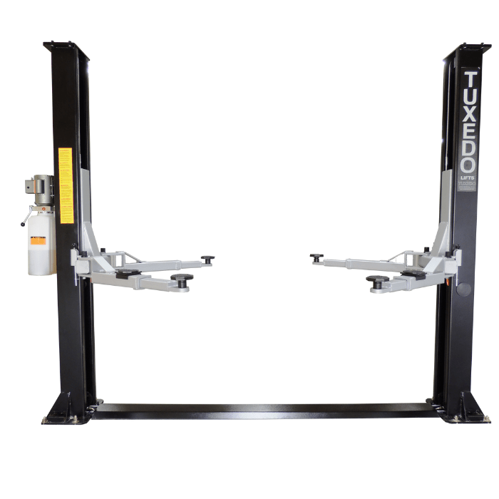 Front-facing view of Tuxedo TP9KF-TUX 2 post lift showing symmetric arm design