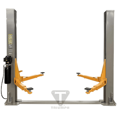 Front-facing view of the Triumph NT-11 11,000 lb Two Post Car Lift featuring dual gray columns, asymmetrical orange lifting arms, and a mounted hydraulic power unit for heavy-duty vehicle service.