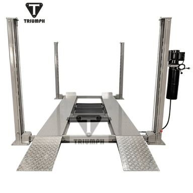 Front approach of the Triumph NSS-8 8,000 lb Four-Post Car Lift, featuring diamond-plate runways, four upright columns, and a side-mounted hydraulic power unit for secure vehicle hoisting.