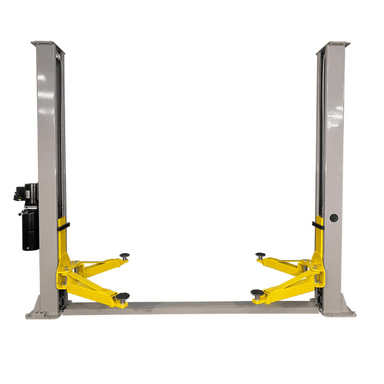 Front view of the Triumph NT-9 two-post car lift featuring yellow arms and overhead cable design for efficient auto repair access