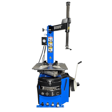 Front view of the Triumph NTC-950 Tire Changer with a pneumatic assist tower, foot pedal controls, and a sturdy turntable for efficient tire servicing.
