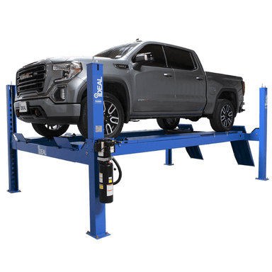 GMC Sierra pickup truck elevated on an iDEAL FP14KAC-X 4-post alignment lift.