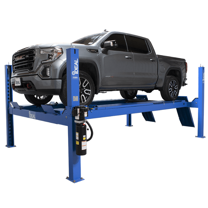 GMC Sierra pickup truck elevated on an iDEAL FP14KAC-X 4-post alignment lift.