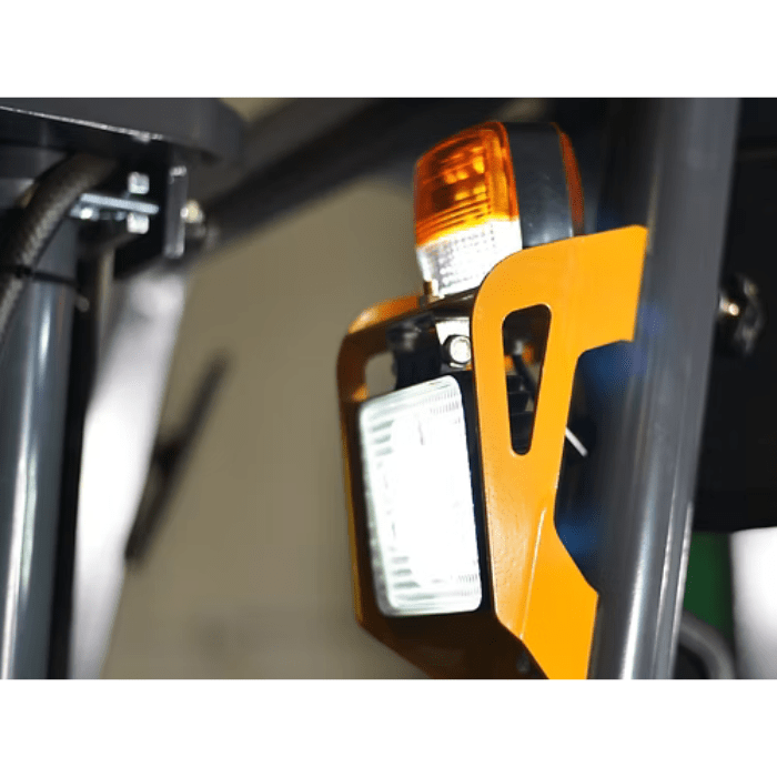 Mounted safety light and orange protective cage on the Ekko EK16A-177 enhance visibility and operator safety indoors.