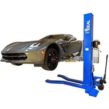 Portable iDEAL single column lift securely elevating Corvette for service