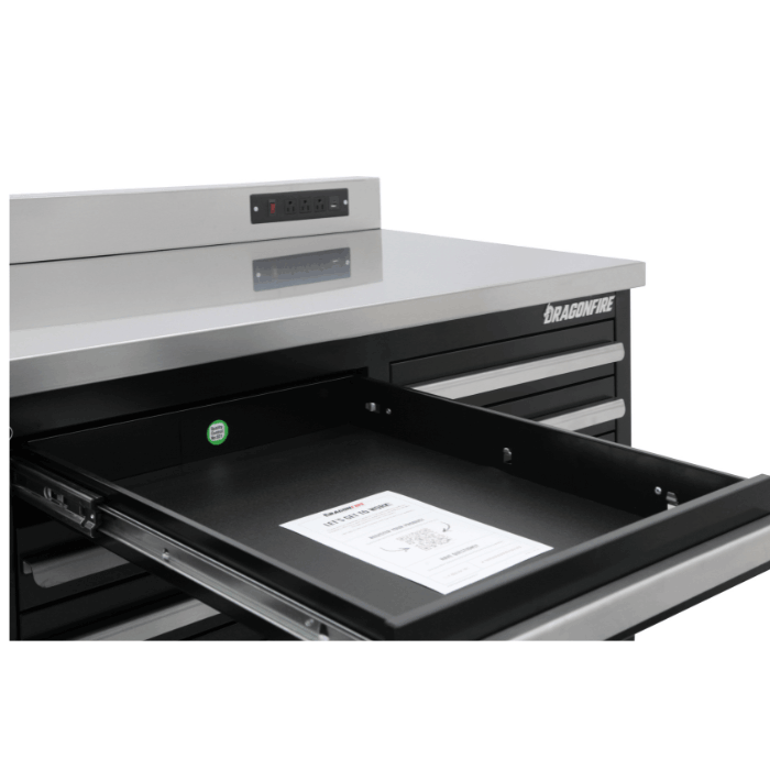 Pull-out tray close-up on the black Dragonfire Pro Series 7FT workbench with stainless backsplash and built-in power outlets (DFT-WB-24)