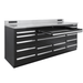 Pull-out tray drawer extended on the black Dragonfire DFT-WB-17 7ft workbench, showing full-width drawer storage