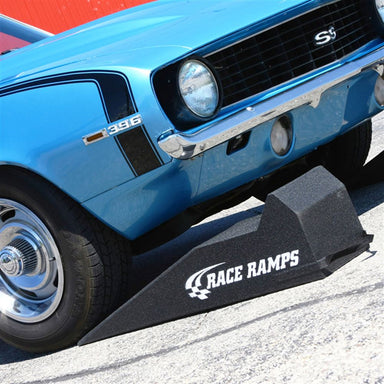 Low nose Camaro driven onto a Race Ramps RR-40 sport ramp