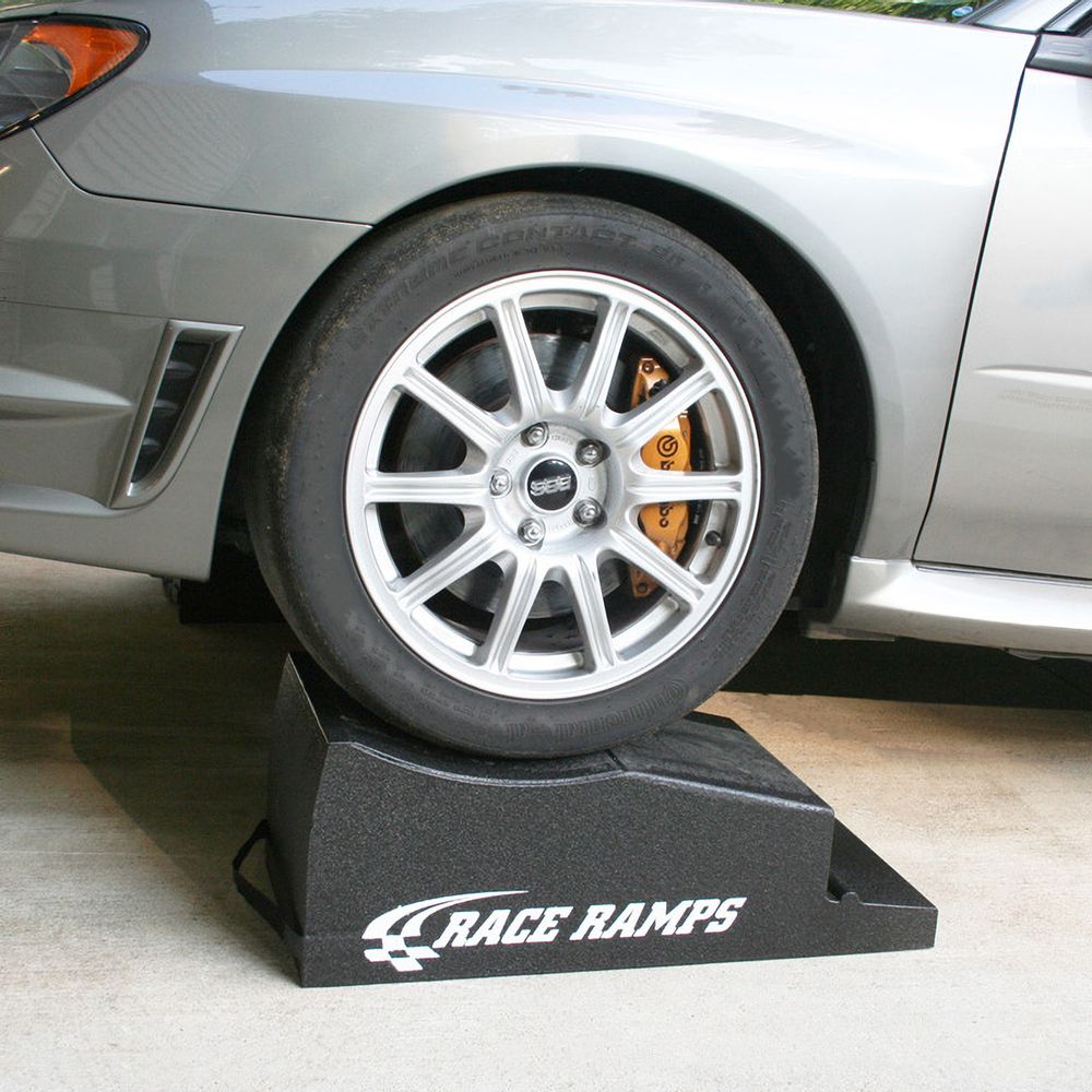 Close up of a tire on the top block of a Race Ramps combo ramp