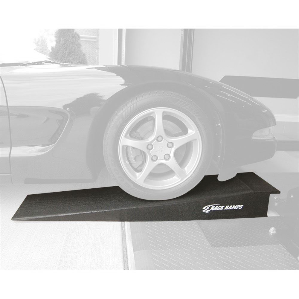 Corvette front wheel driving onto a Race Ramps lip nose rack ramp