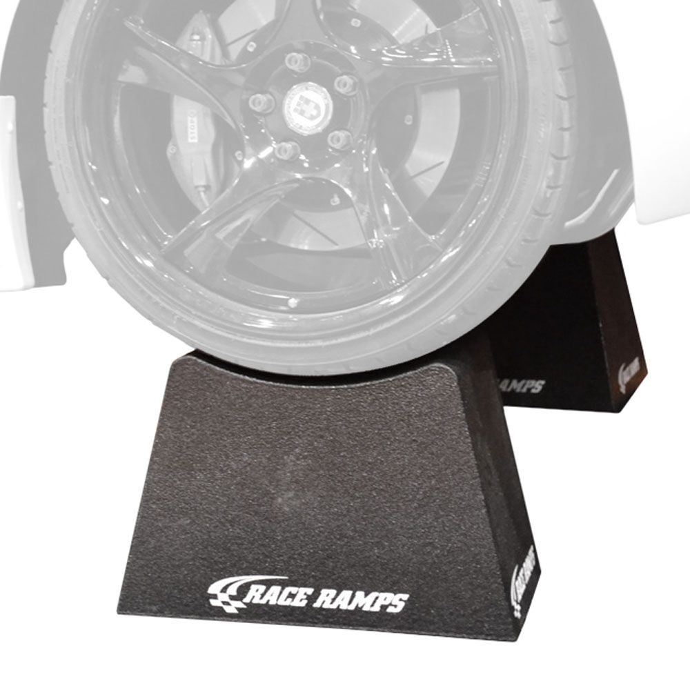 Tire seated in the cradle of a Race Ramps show crib