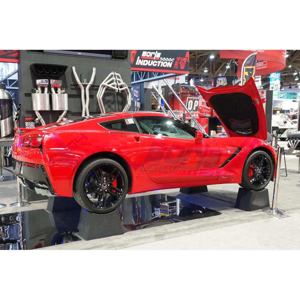 Corvette displayed on Race Ramps show cribs at an indoor show