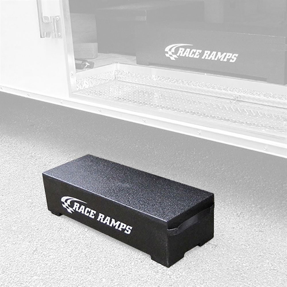 Race Ramps trailer step placed at an enclosed trailer door
