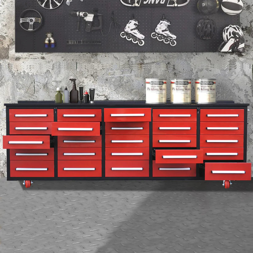 Red 10ft 25 drawer rolling workbench cabinet by Chery Industrial in a garage with multiple drawers extended