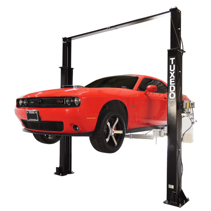 Red Dodge Challenger lifted on Tuxedo TP9KAC-TUX 2 post asymmetric clear floor lift