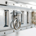 Showing one of the hooks on the side of the Auxx-One motorized storage lift used to attach items
