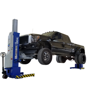 Side angle of Ford Super Duty lifted on iDEAL MSC-18K-X-236 mobile column lifts.