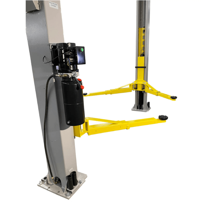 Side view of the Triumph NTO-10A Vehicle Lift showcasing the hydraulic power unit, base plate anchors, and durable asymmetric lift arms.