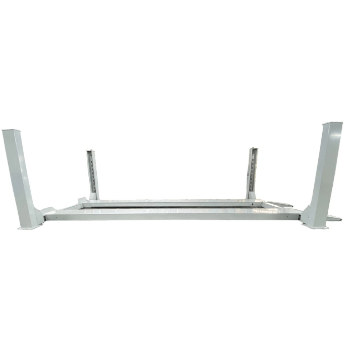 Side view of the Triumph NTR-32 32,000 lb Heavy-Duty Four Post Vehicle Lift with wide steel columns and diamond-plate runways.