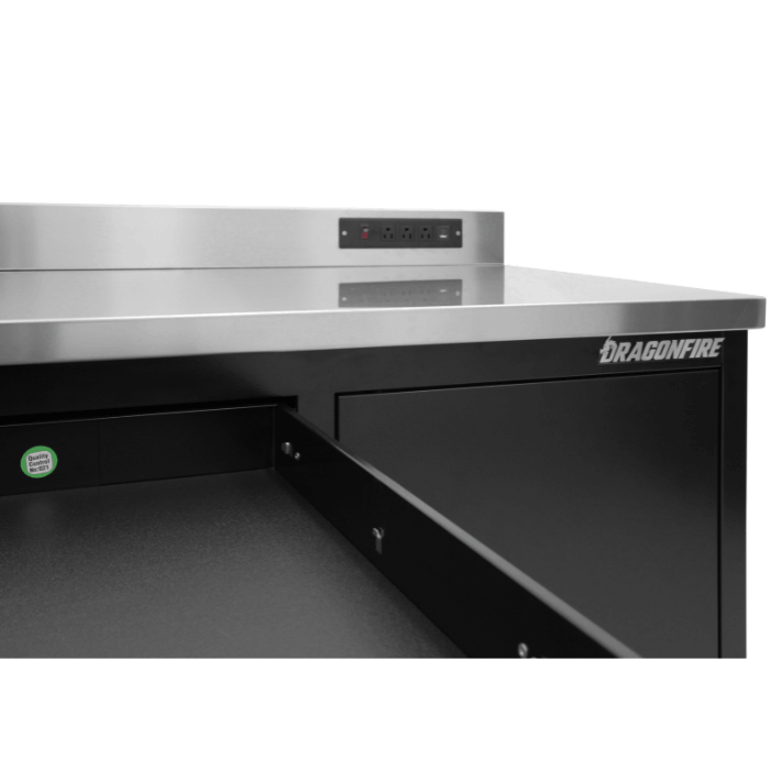 Stainless countertop and pull-out tray detail on the black Dragonfire Pro Series workbench (DFT-WB-12), with integrated power strip