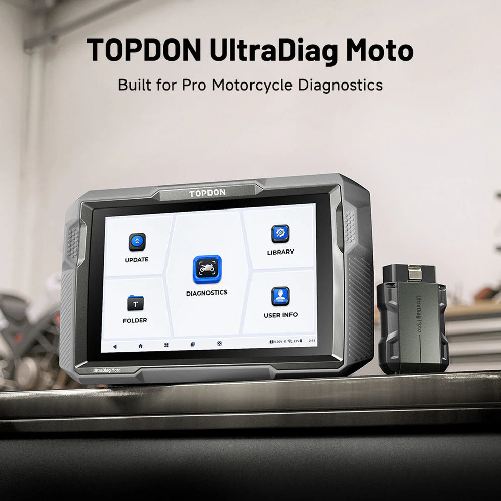 TOPDON UltraDiag Moto diagnostic tablet with wireless VCI on workbench