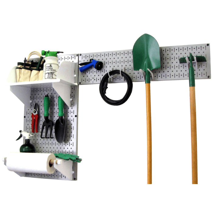 The Pegboard Garden Tool Board Organizer Kit by Wall Control with a gray pegboard and white accessories