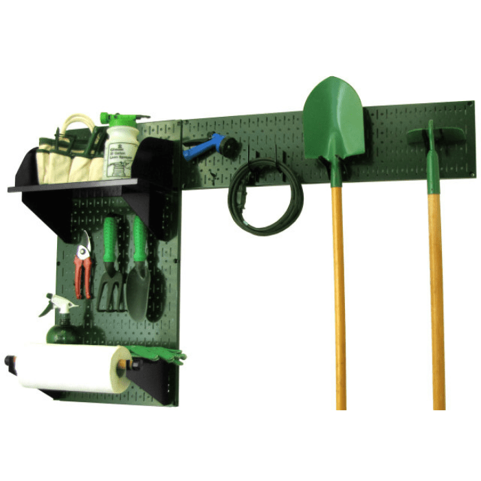 The Pegboard Garden Tool Board Organizer Kit by Wall Control with a green pegboard and black accessories with tools