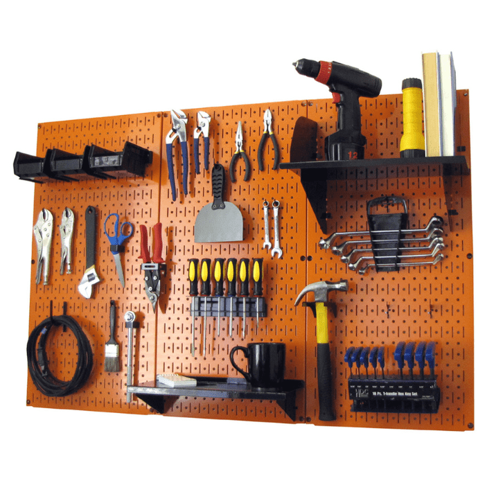 The Ultimate Metal Pegboard with black accessories and orange pegboard with tools