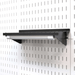 The Magnetic LED Light Bar for the Master Pegboard Workbench Kit mounted to a shelf