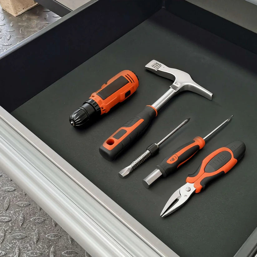 Tools stored inside a Chery Industrial cabinet drawer showing wide storage space and smooth slide action