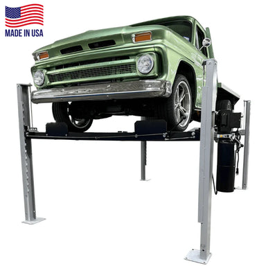 Triumph USA8000XLT extra long & tall 4-post lift with classic truck at service height, power unit visible