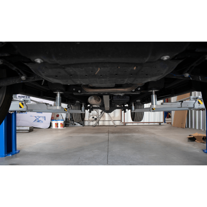 Undercarriage view of vehicle lifted by iDEAL TP10KAC-DX