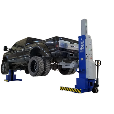 iDEAL MSC-18K-X-236 mobile column lifts raising a Ford Super Duty truck.