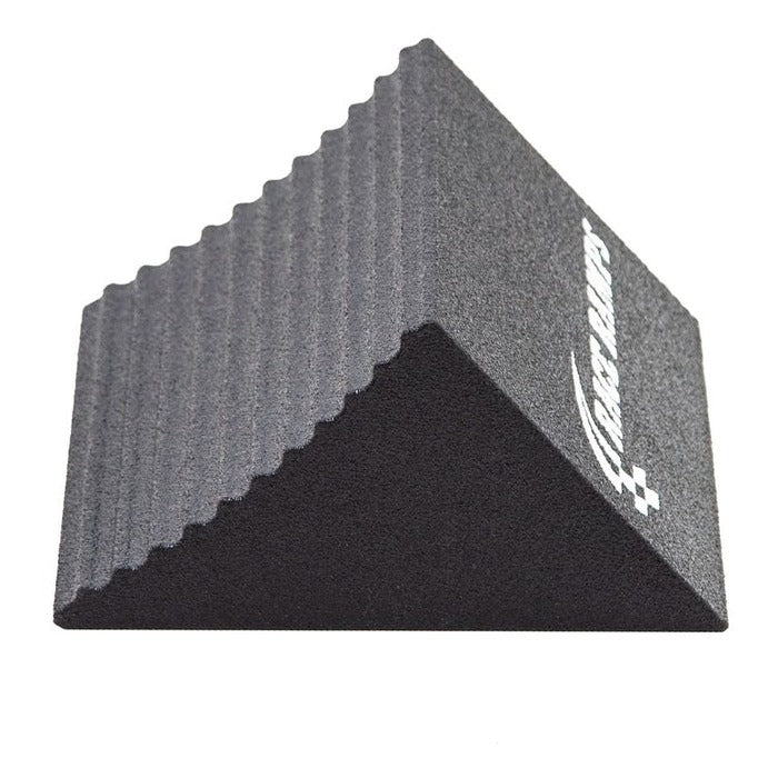 Race Ramps Racer Chock angled view showing the traction coating