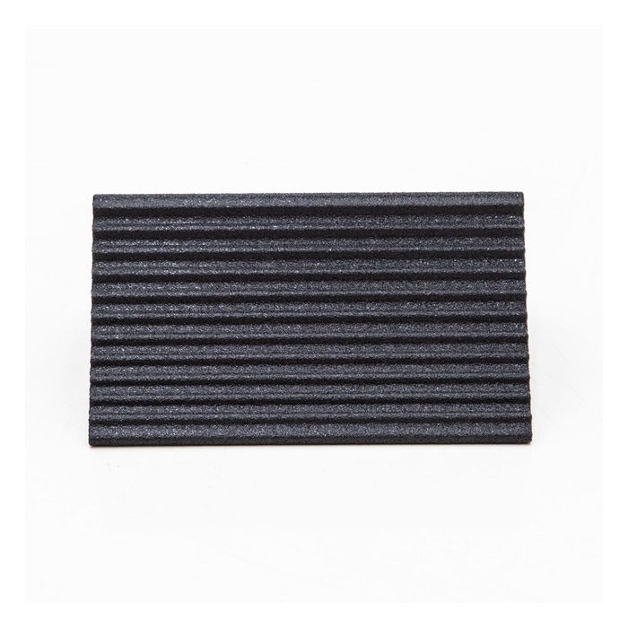 Contoured and ribbed tire face of the Race Ramps Racer Chock