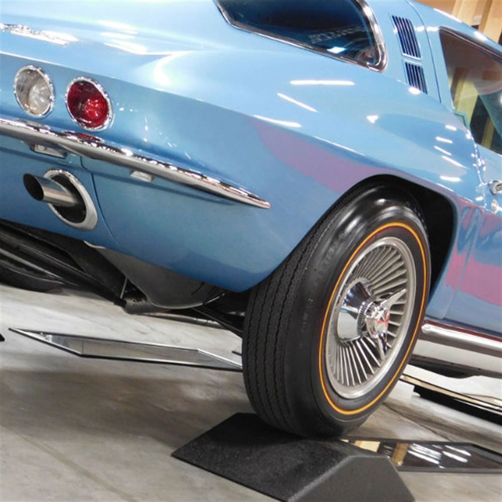 Front wheel of a classic Corvette raised on a Race Ramps Show Ramp