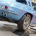 Front wheel of a classic Corvette raised on a Race Ramps Show Ramp