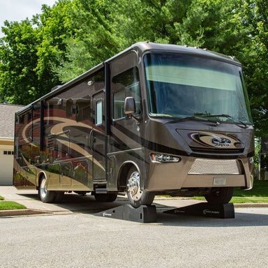Motorhome raised on Race Ramps Super Duty Service Ramps